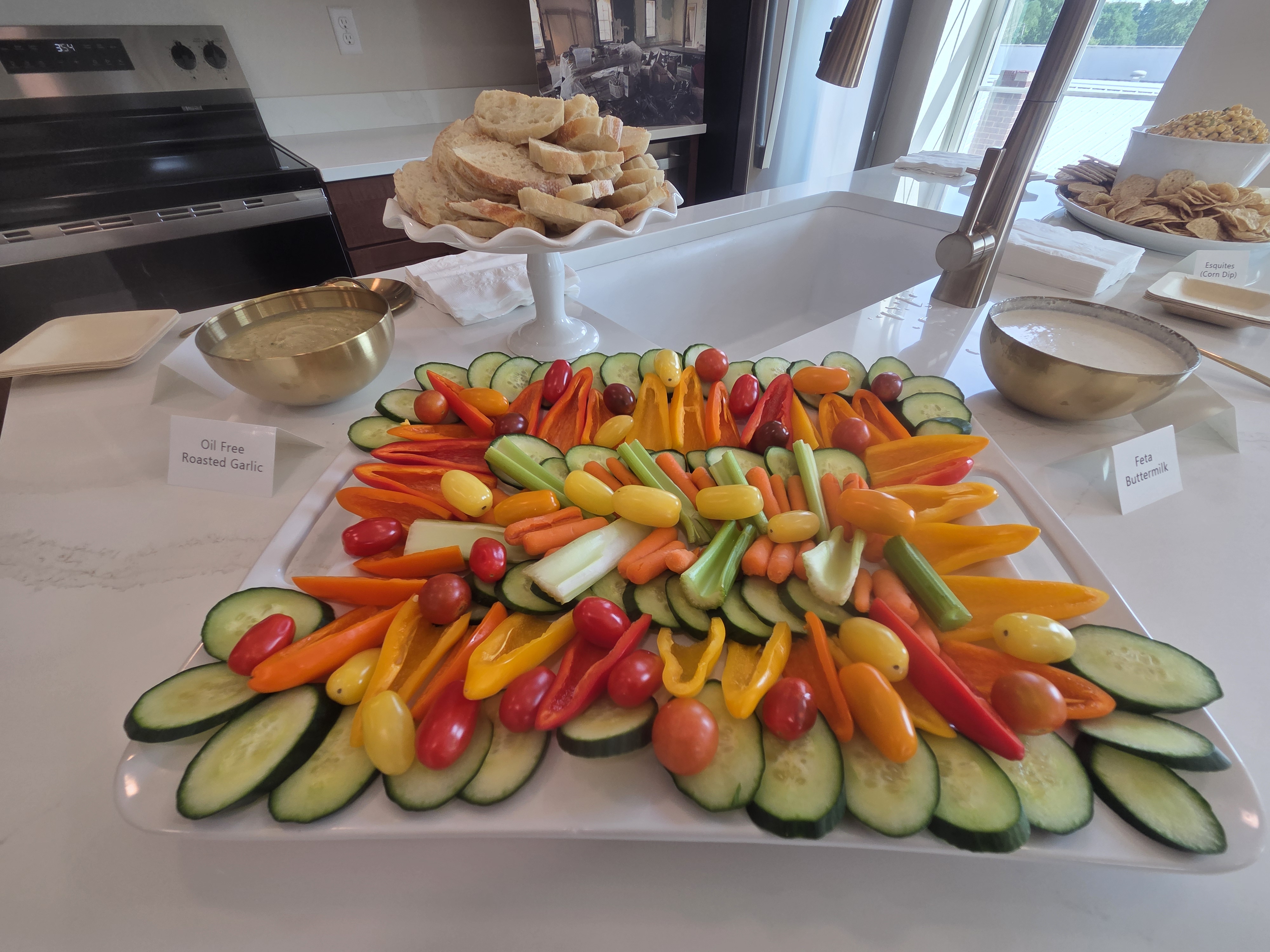 Fresh vegetables with roasted garlic and feta-buttermilk dips.